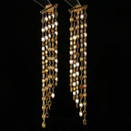 925 sterling silver tile chain tassel earrings in gold tone, 24K gold plated, 9cm drop, multi-strand flat tile chain design, displayed on black background