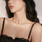 Model wearing FFIENLEE 925 sterling silver tile chain necklace in rhodium silver tone with matching tile chain tassel earrings, styled with a black lace lingerie top, sensual and feminine look, FFIENLEE branding