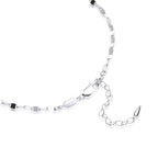 Close-up detail of FFIENLEE 925 sterling silver Y-lariat necklace in rhodium silver tone, showing lobster claw clasp, branded hexagon tag, and extension chain with teardrop end on white background